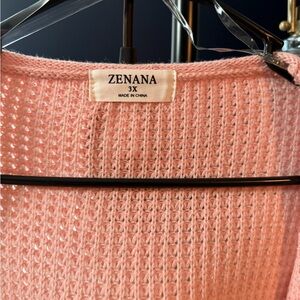 Peach cardigan.